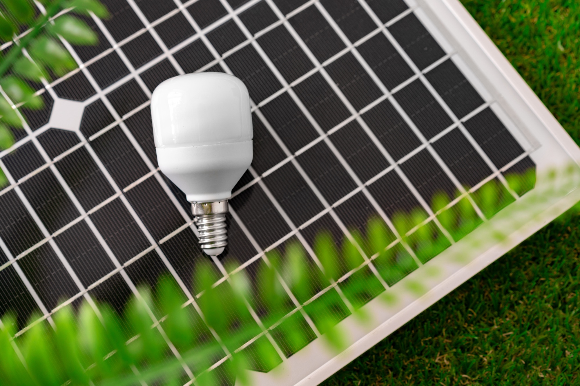 Solar energy panel and light bulb, green energy